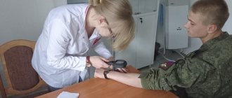 soldier being examined by a doctor
